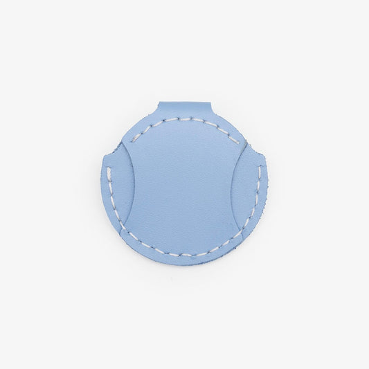 Light-Blue leather AirTag holder for cats with gold button, handmade from Italian leather on a white background