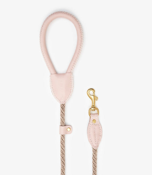 Full view view of a luxury pink leather dog leash with durable rope and premium stitching detail