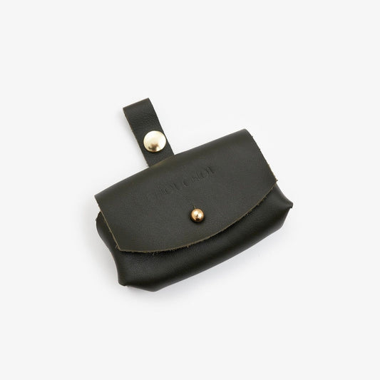 Olive Italian leather dog waste bag dispenser with gold hardware on a white background