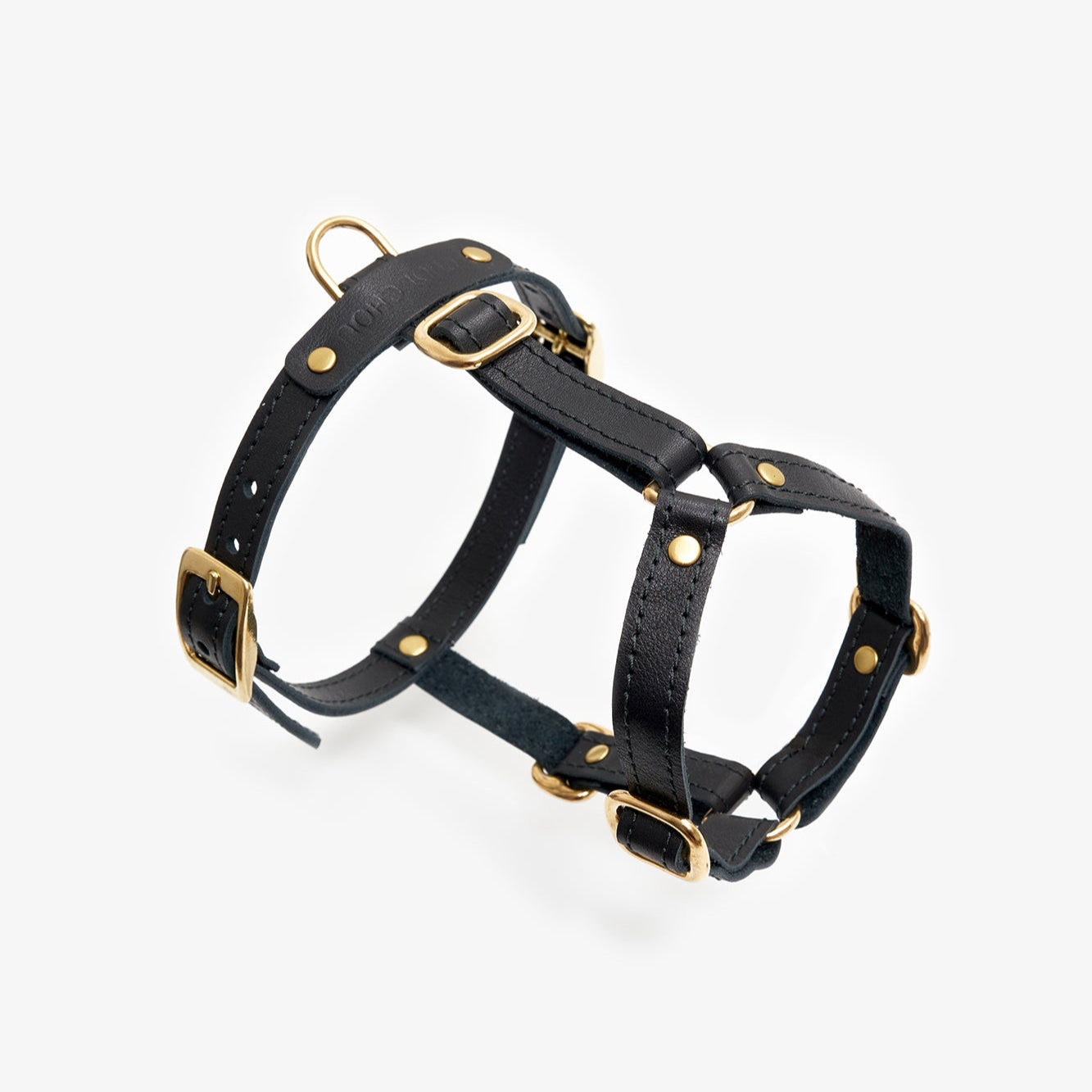 Premium black dog harness made from high-quality leather with stylish hardware, offering freedom of movement
