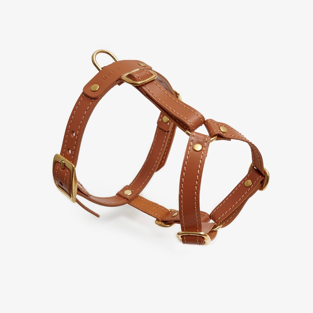 Premium brown dog harness made from high-quality leather with stylish hardware, offering freedom of movement